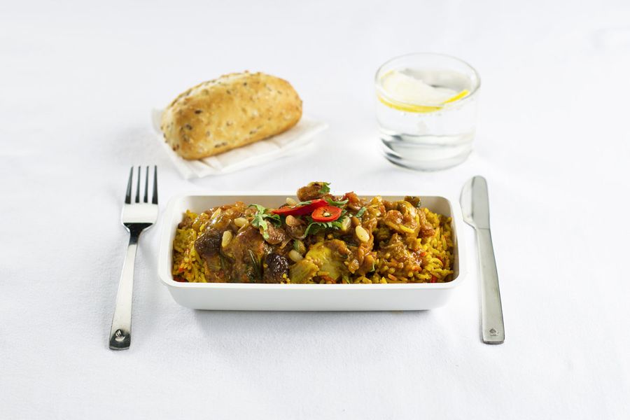 Indian Chicken Biryani with Shallots, Coriander, Raisins, Raita and Cucumber